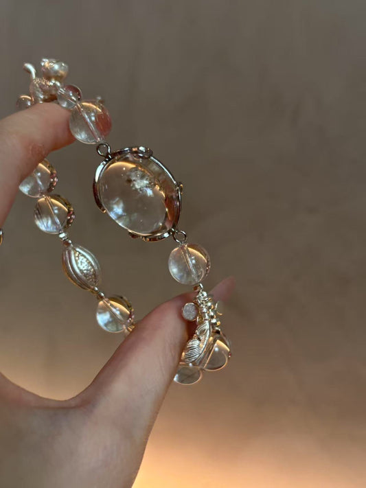 Silver Radiance: Rutilated Quartz & 925 Silver Amulet Bracelet