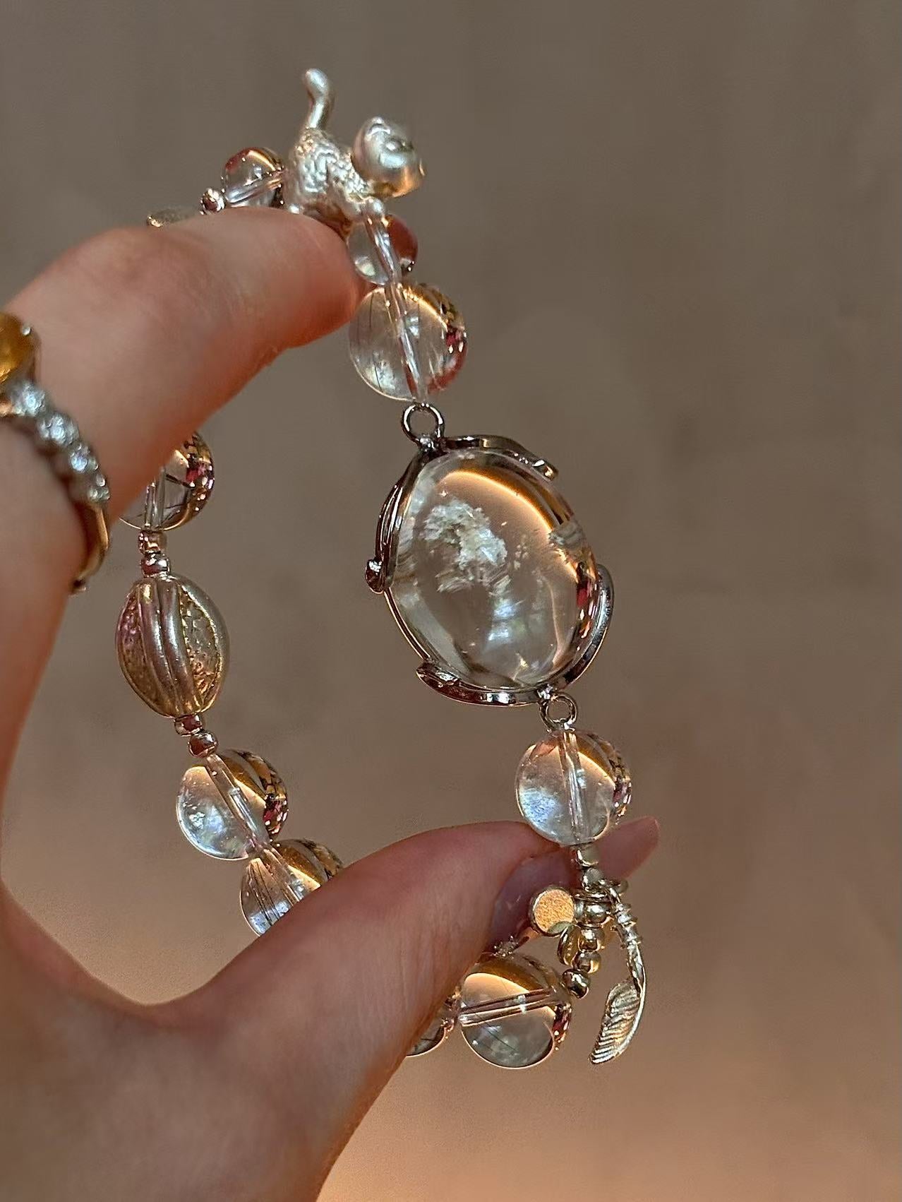 Silver Radiance: Rutilated Quartz & 925 Silver Amulet Bracelet