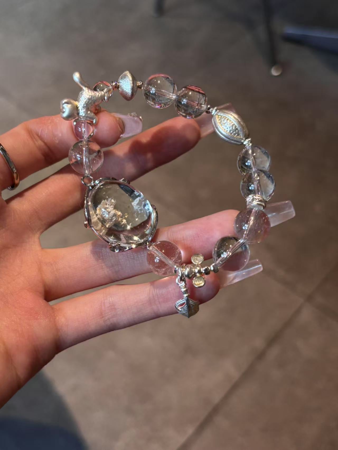 Silver Radiance: Rutilated Quartz & 925 Silver Amulet Bracelet